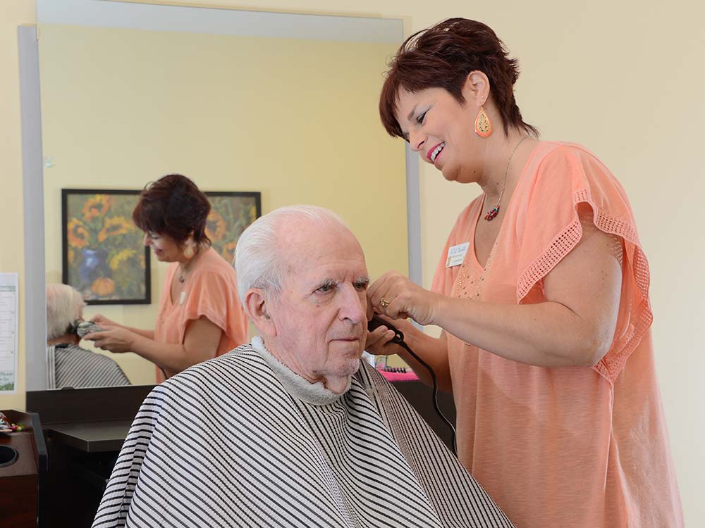 resident has their haircut
